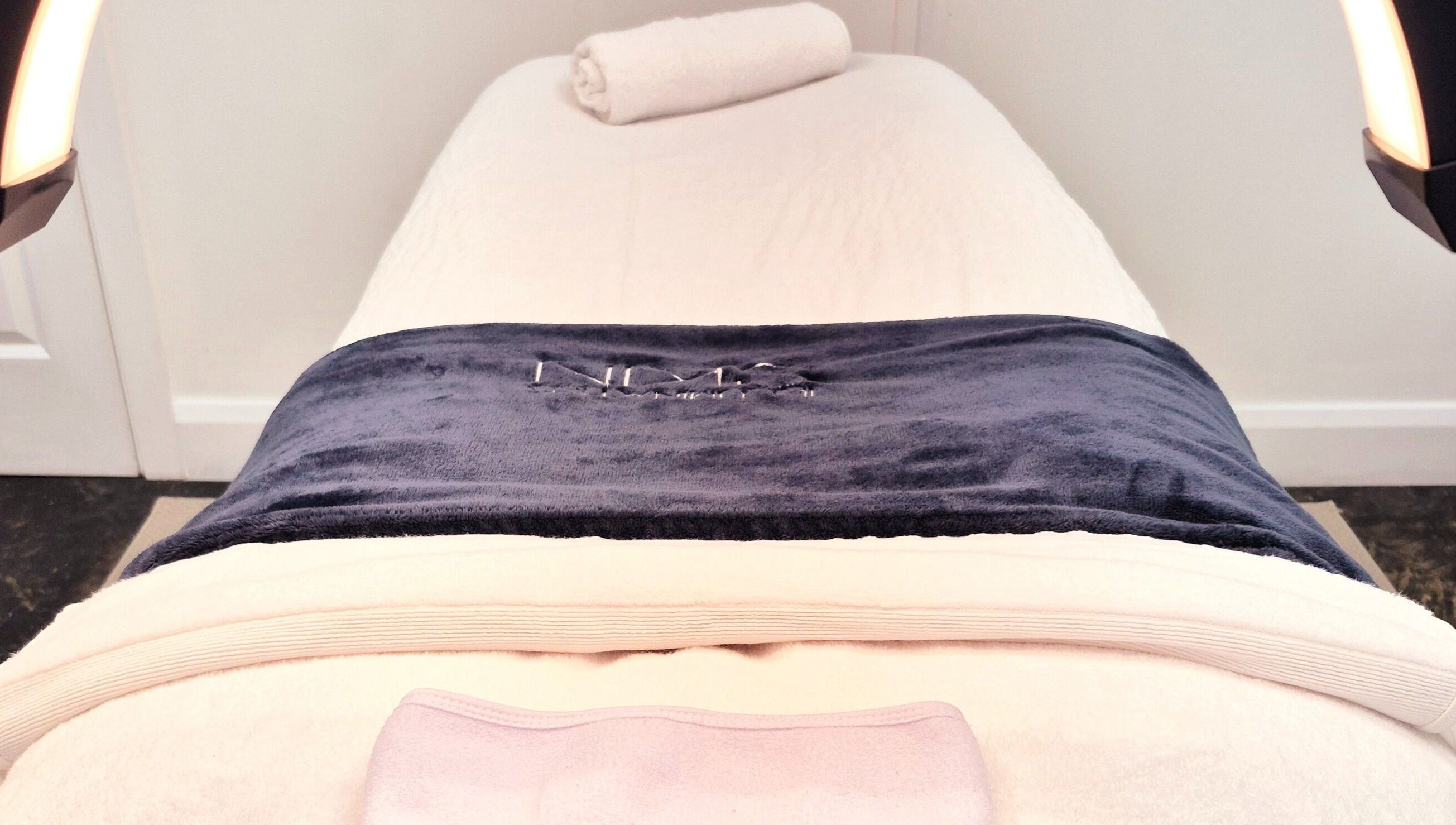 Relaxing treatment bed at Illuminated Skin in Ardee, IE, offering a serene wellness experience.
