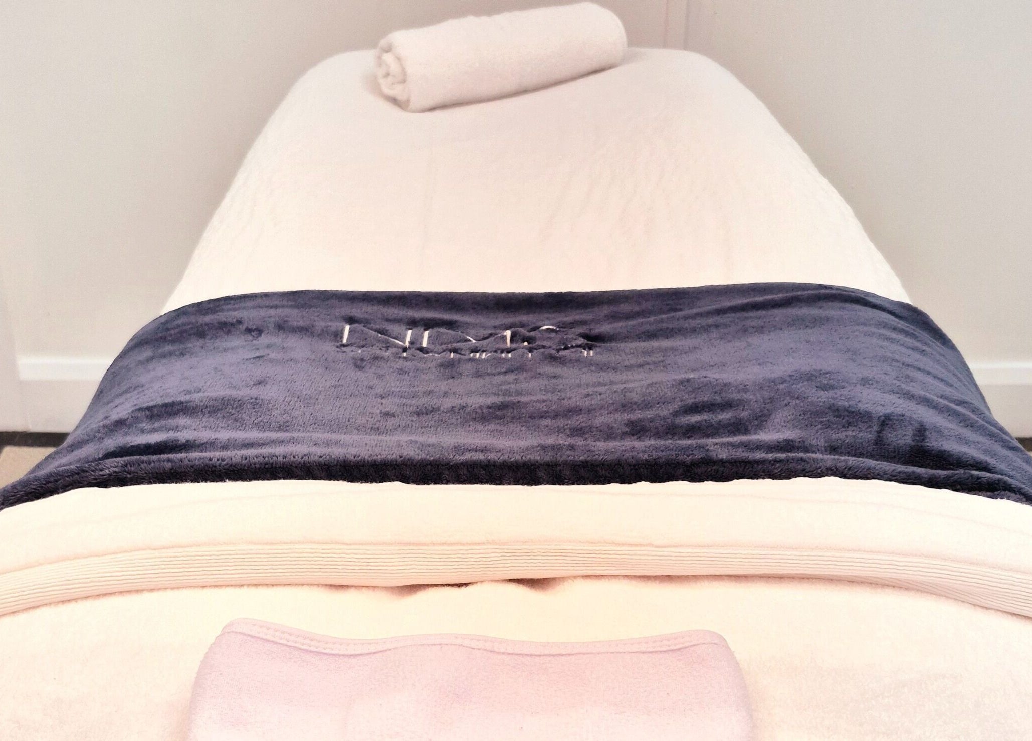 Relaxing treatment bed at Illuminated Skin in Ardee, IE, offering a serene wellness experience.