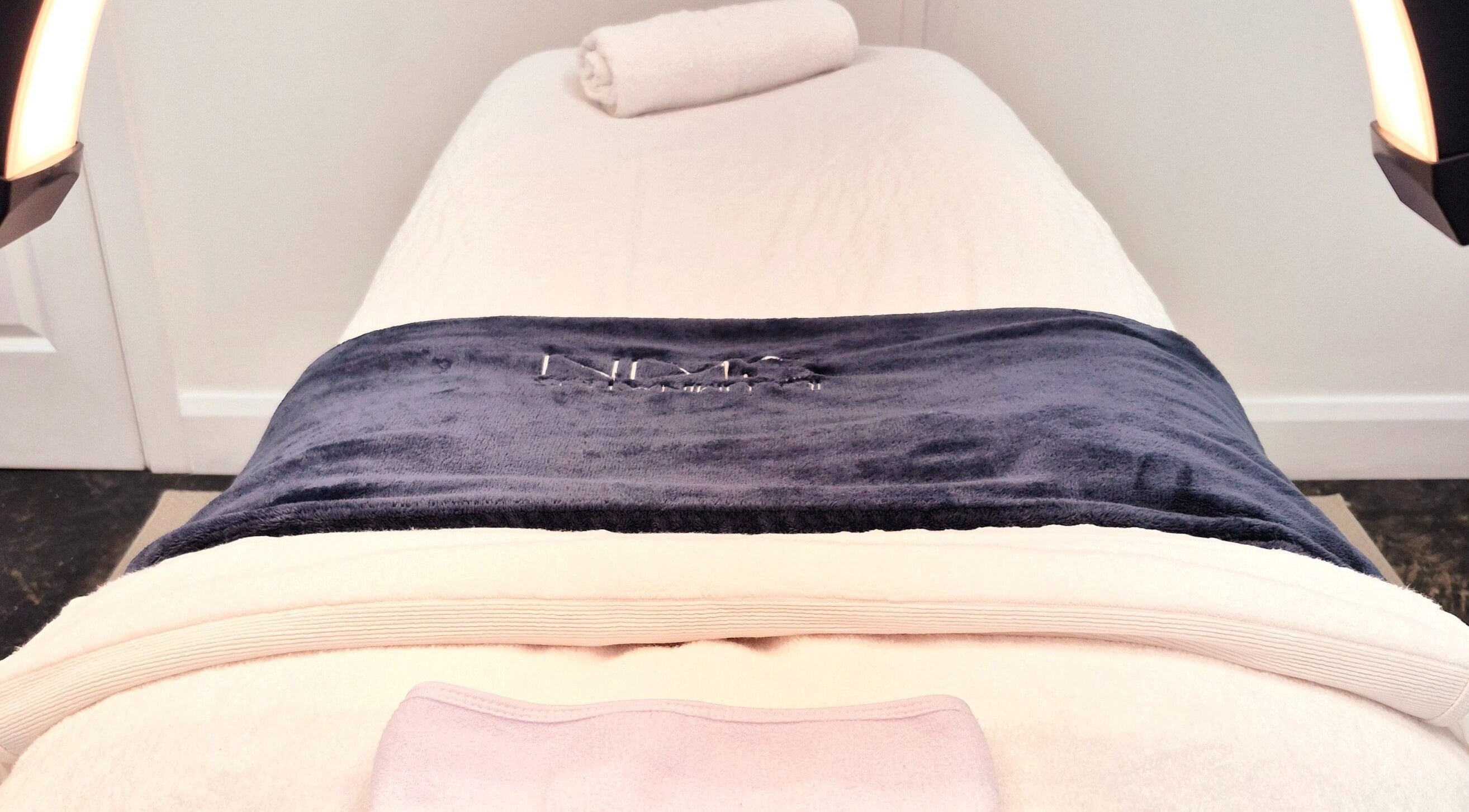 Relaxing treatment bed at Illuminated Skin in Ardee, IE, offering a serene wellness experience.