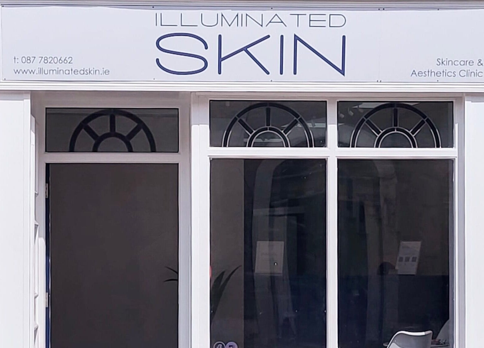 Front view of Illuminated Skin in Ardee, IE, showcasing its elegant white facade and signage.