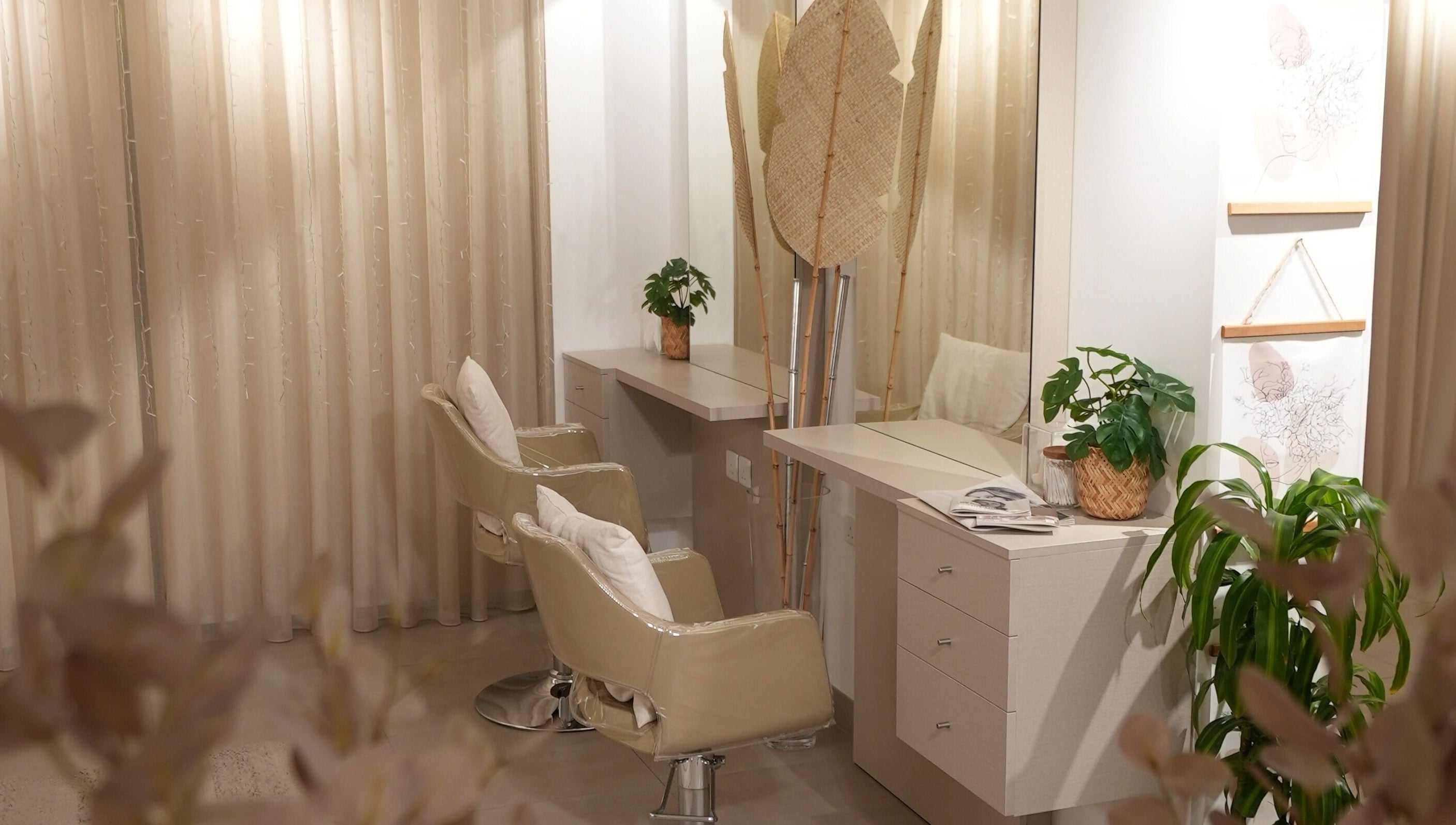 Elegant interior of The Room Boutique Salon in Jeddah, Makkah Province, SA with stylish chairs and decor.