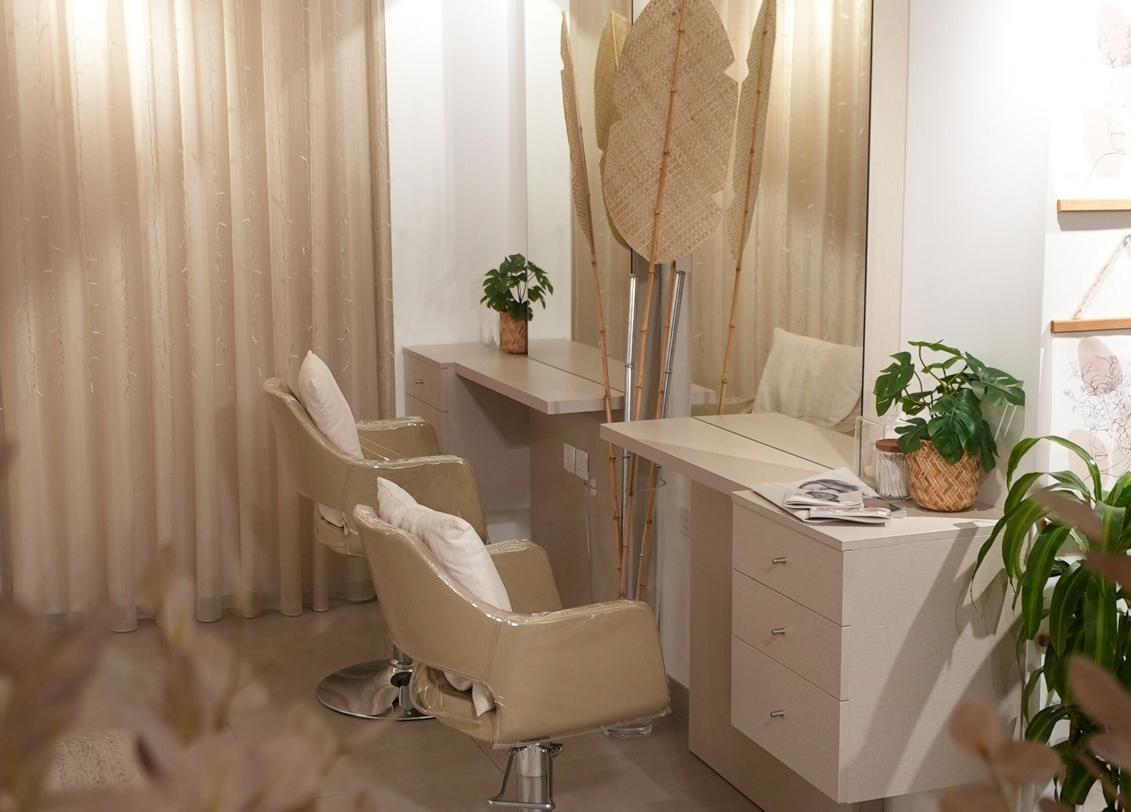Elegant interior of The Room Boutique Salon in Jeddah, Makkah Province, SA with stylish chairs and decor.