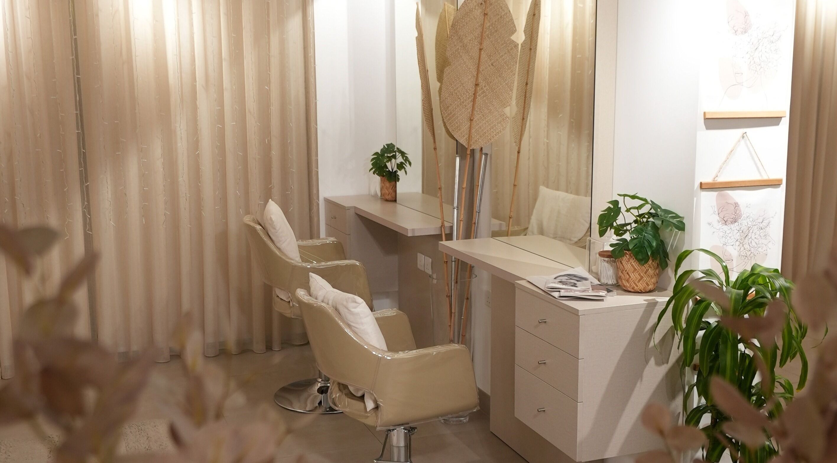 Elegant interior of The Room Boutique Salon in Jeddah, Makkah Province, SA with stylish chairs and decor.