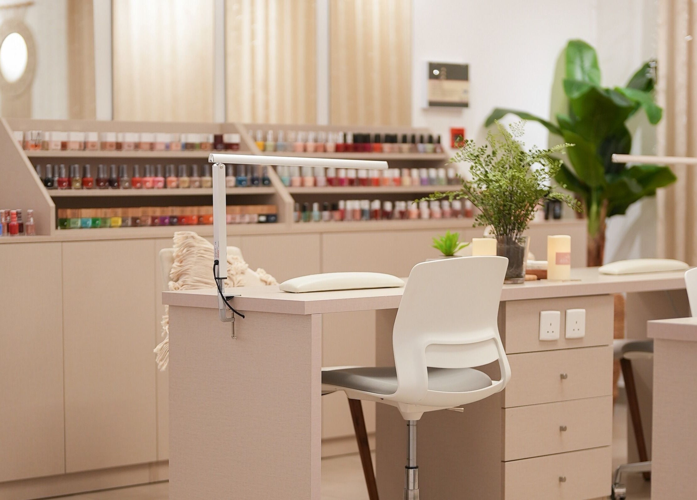 Stylish nail station at The Room Boutique Salon, Jeddah, Makkah Province, SA, showcasing premium nail care setup.
