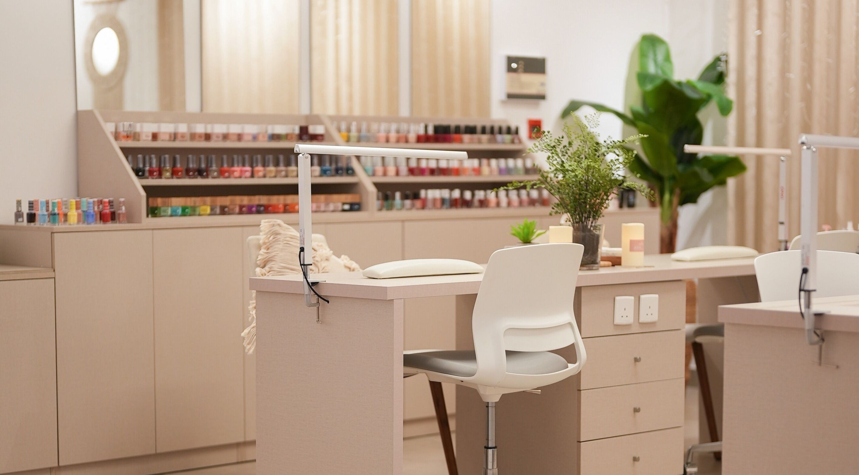 Stylish nail station at The Room Boutique Salon, Jeddah, Makkah Province, SA, showcasing premium nail care setup.