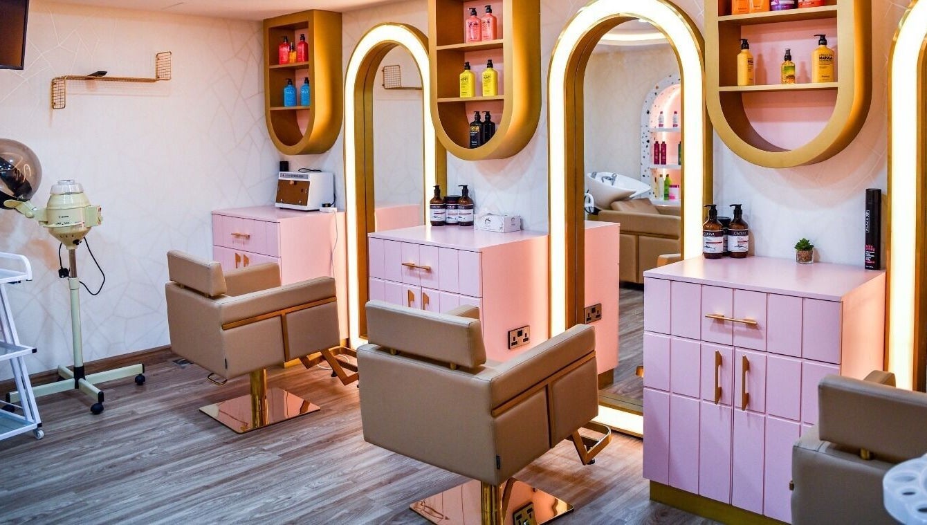 Chic salon interior at The Beauty Lab Ladies Salon, Abu Dhabi, AE, featuring stylish chairs and elegant decor.