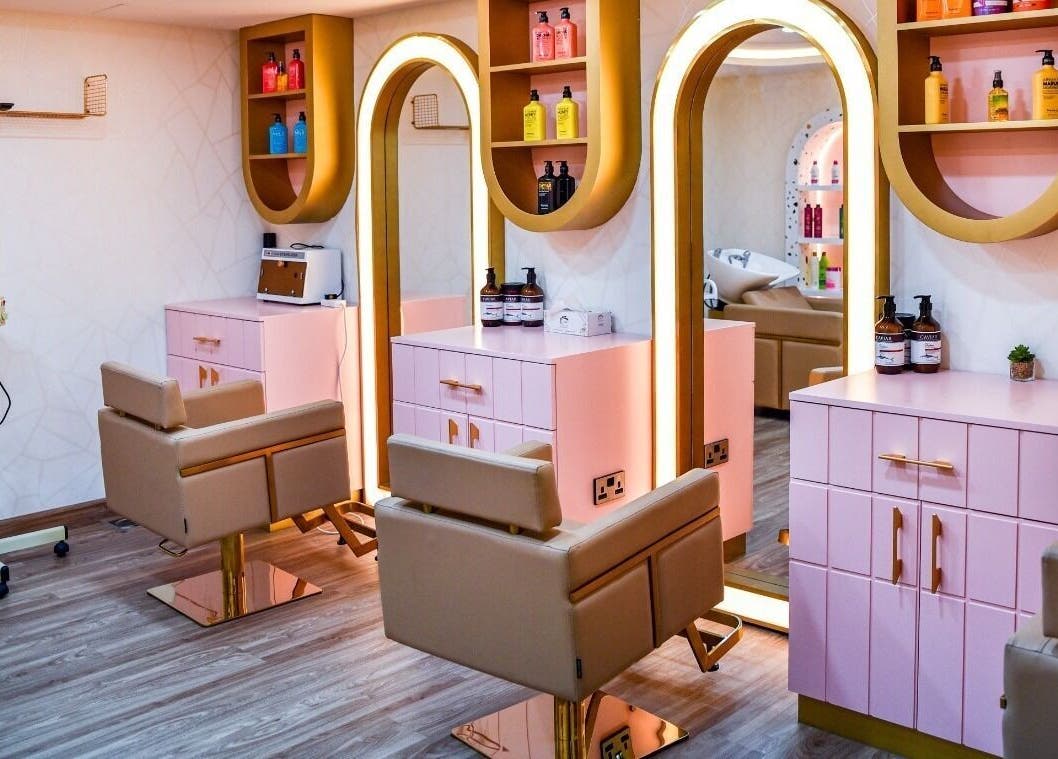 Chic salon interior at The Beauty Lab Ladies Salon, Abu Dhabi, AE, featuring stylish chairs and elegant decor.