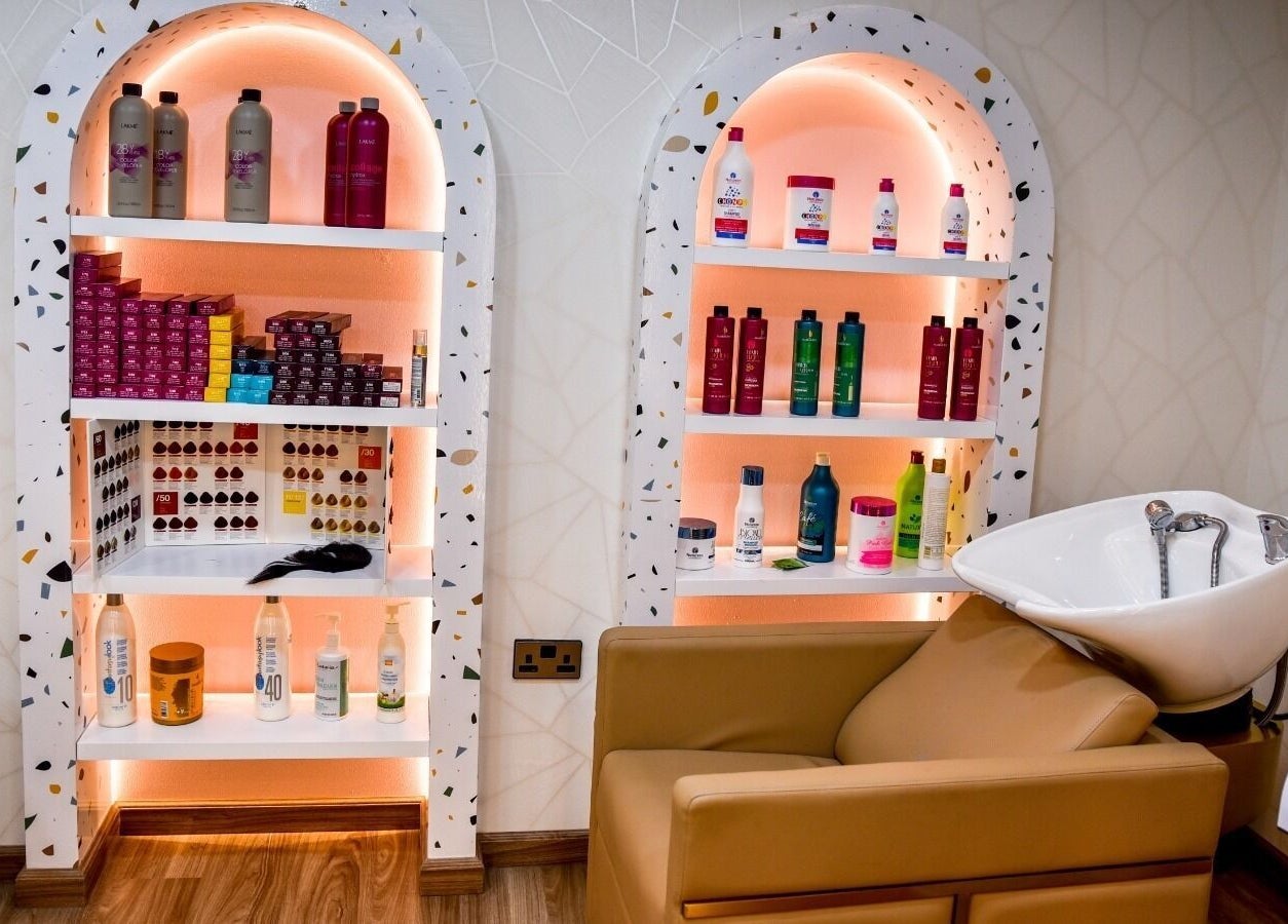 Product shelves at The Beauty Lab Ladies Salon in Abu Dhabi, AE showcasing premium hair and beauty products.