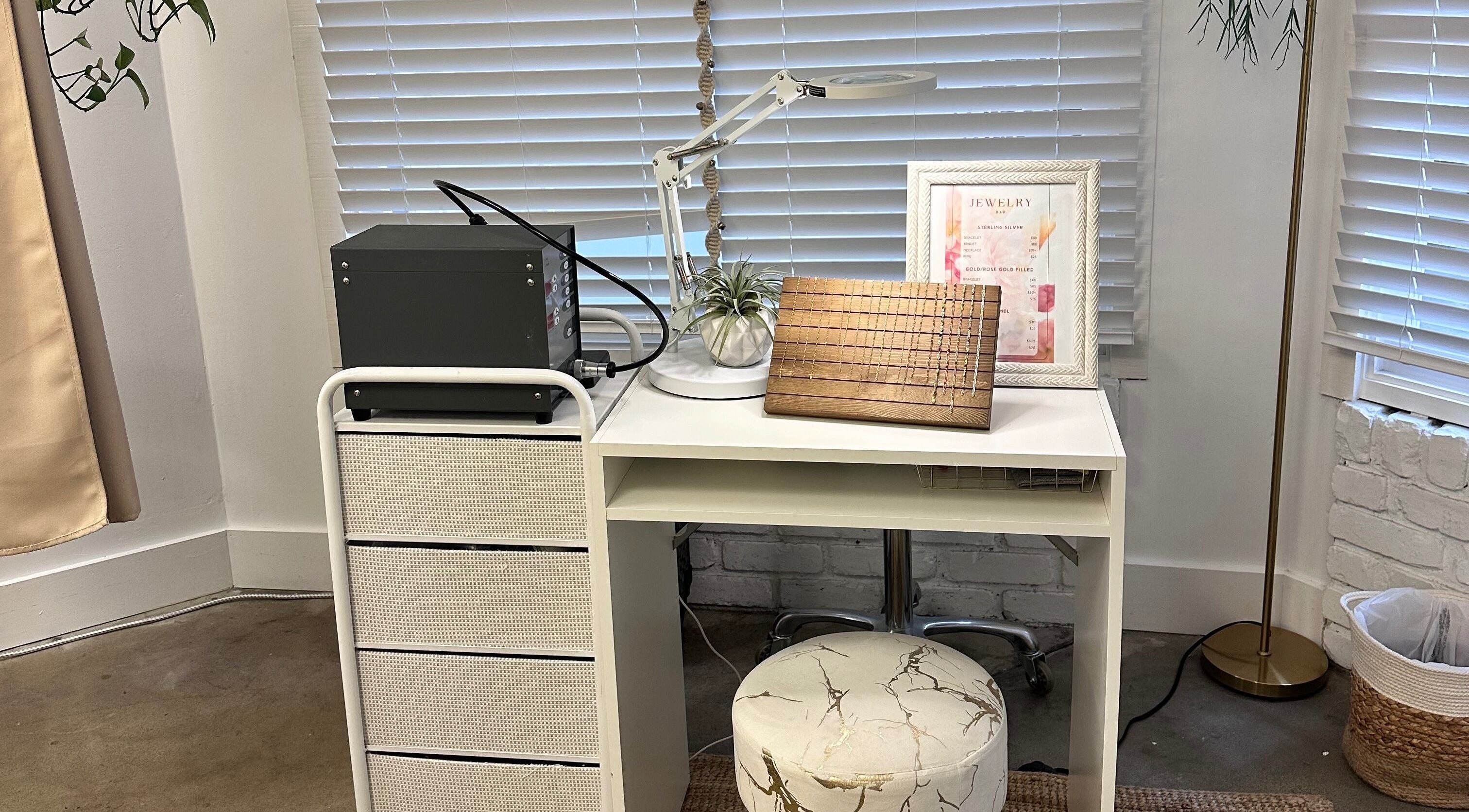 Chic beauty workspace at SB Artistry, Costa Mesa, California, US featuring modern decor and bright lighting.