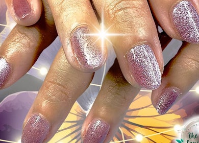 Glistening nails at The Nail Sanctuary Blackpool, England, shining with glitter polish.