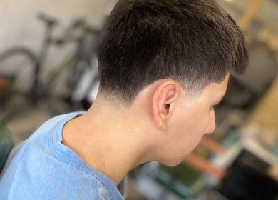 Close-up of a fresh fade haircut at Hm barbers in London, England, GB showing precision and style.