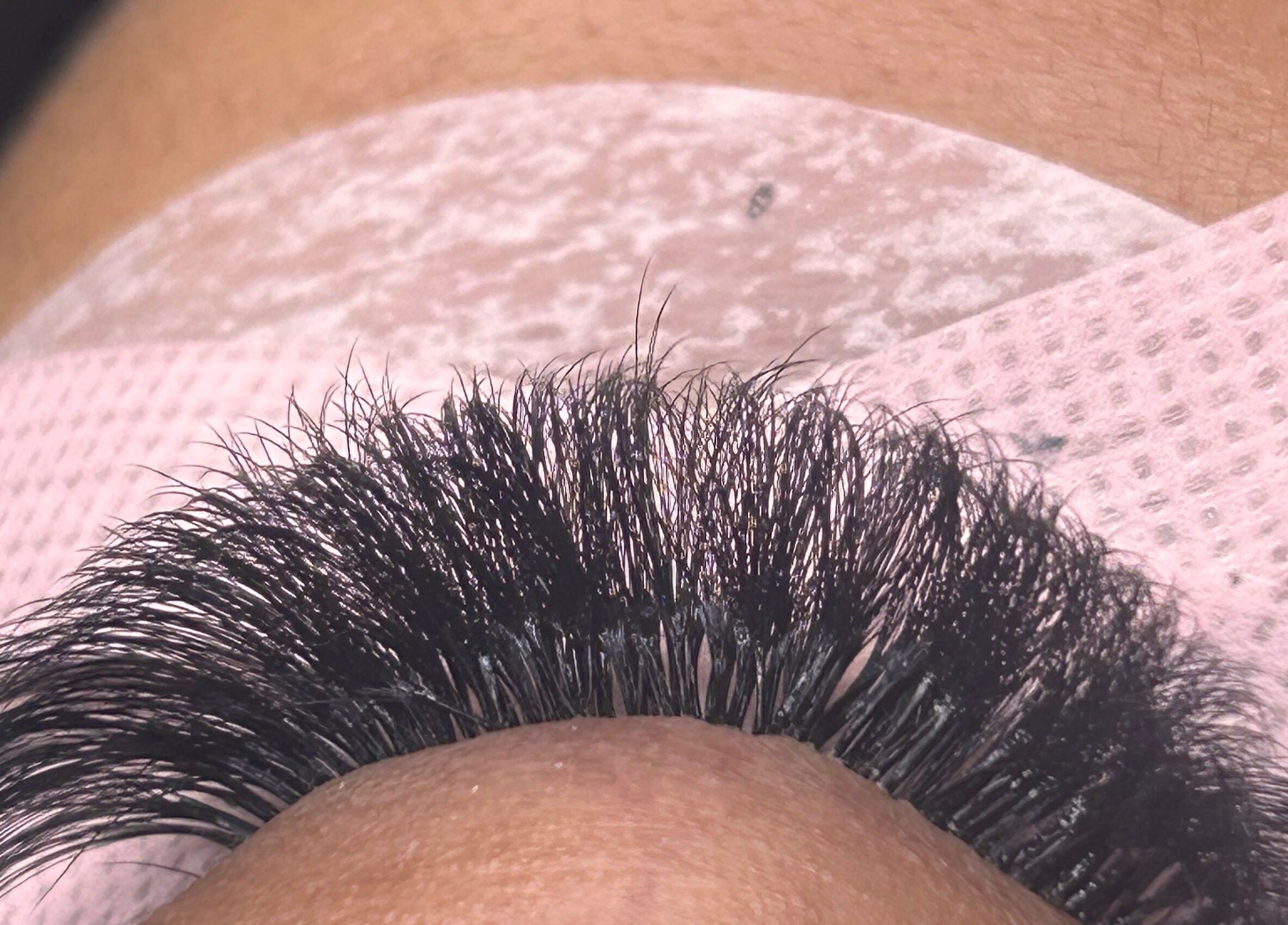 Close-up of expertly applied eyelash extensions at Divine Beauty, Milton Keynes, England, GB.