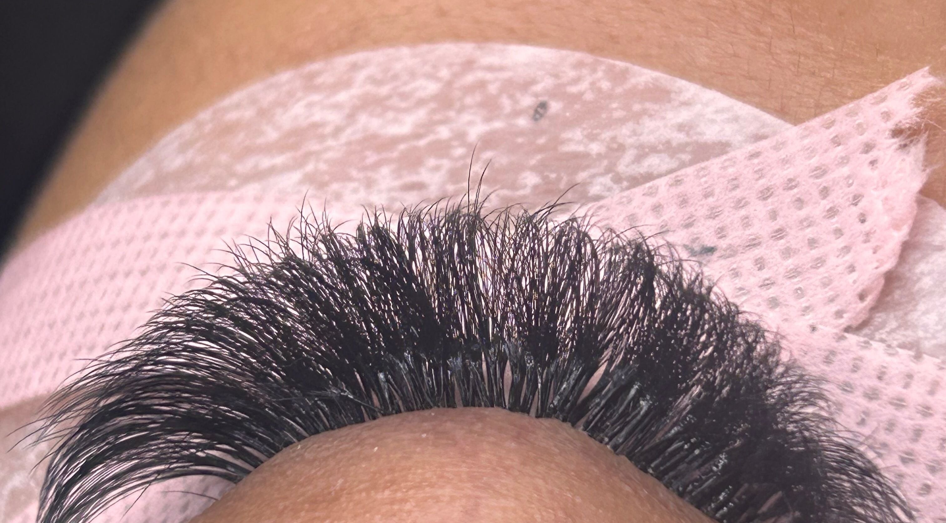Close-up of expertly applied eyelash extensions at Divine Beauty, Milton Keynes, England, GB.