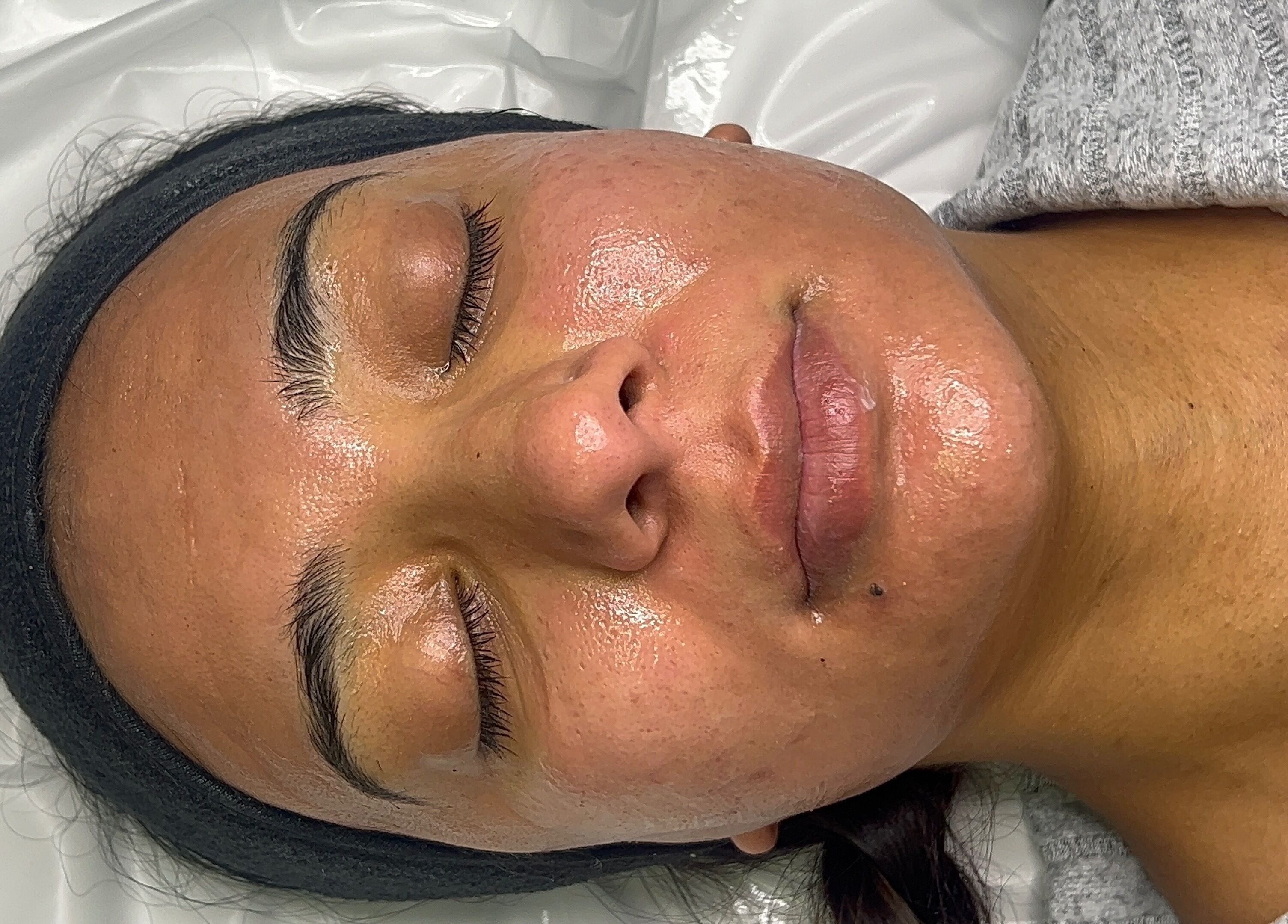 Relaxing facial treatment at Divine Beauty, Milton Keynes, England, GB, highlighting smooth and glowing skin.