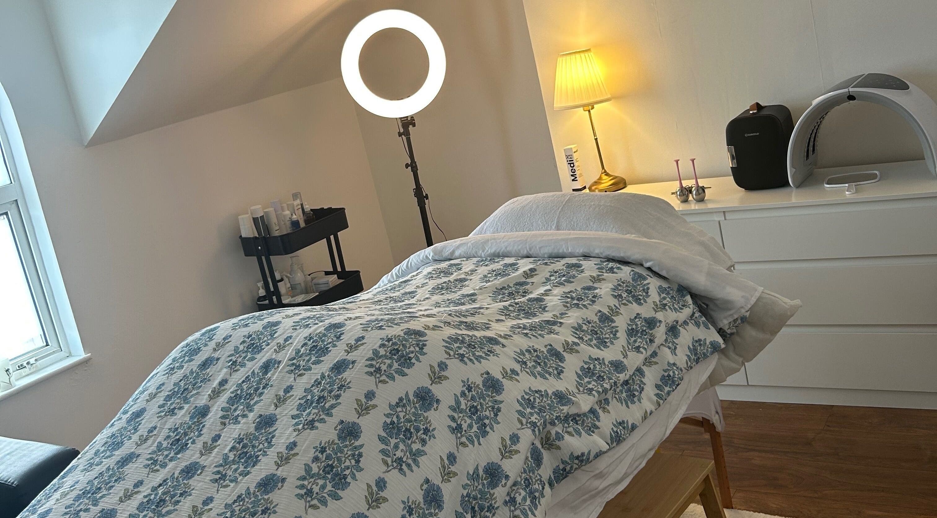 Relaxing treatment room at Rebecca Duffy Advanced Skin, Belfast, Northern Ireland, GB, featuring cozy decor.