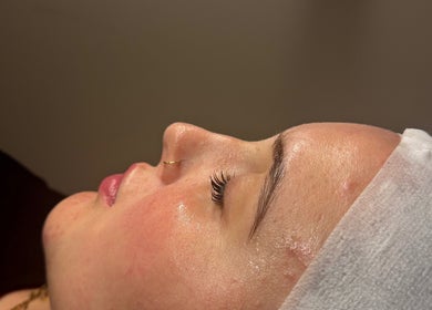 Close-up of a serene face with glowing skin at Afterglow Beauty Ltd, Goole, England, GB.