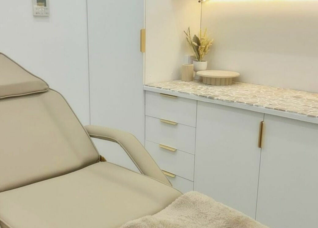 Atlas Medi London spa room with plush chair and ambient lighting, Adelaide, South Australia, AU.