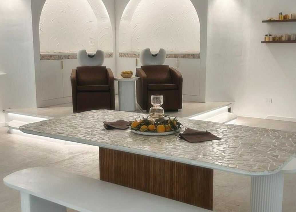 Relaxing interior of Atlas Medi London in Adelaide City, South Australia, AU, showcasing elegant spa chairs and decor.