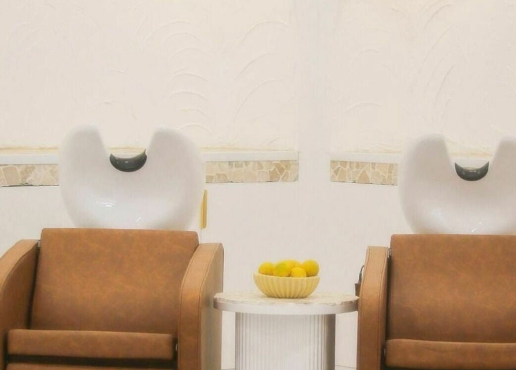 Luxurious wash station at Atlas Medi London in Adelaide City, South Australia, AU, featuring plush seating.