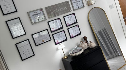 Lash Box Mcr awards and certificates displayed in Greenmount, England, GB, enhancing the beauty setting.