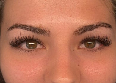 Close-up of eye with elegant eyelash extensions at Beauty Hall, Watford, England, GB.