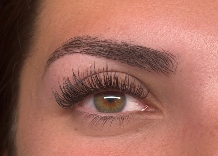 Close-up of eye with lush eyelashes at Beauty Hall, Watford, England, GB.