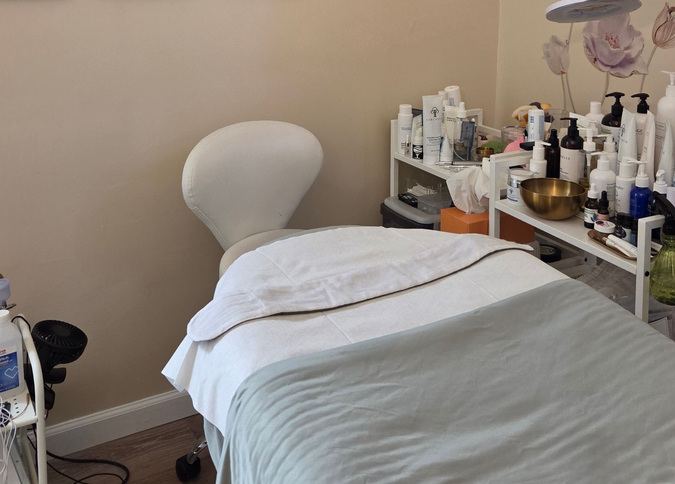 Relaxing skincare treatment room at Innersol Skincare, Fair Lawn, New Jersey, US with calming decor and products.