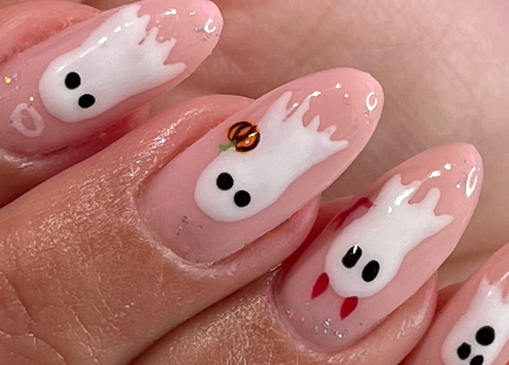 Elegante diseño de uñas fantasmas en Retouch Nails, Aguada, Aguada, PR, perfecto para un look creativo.