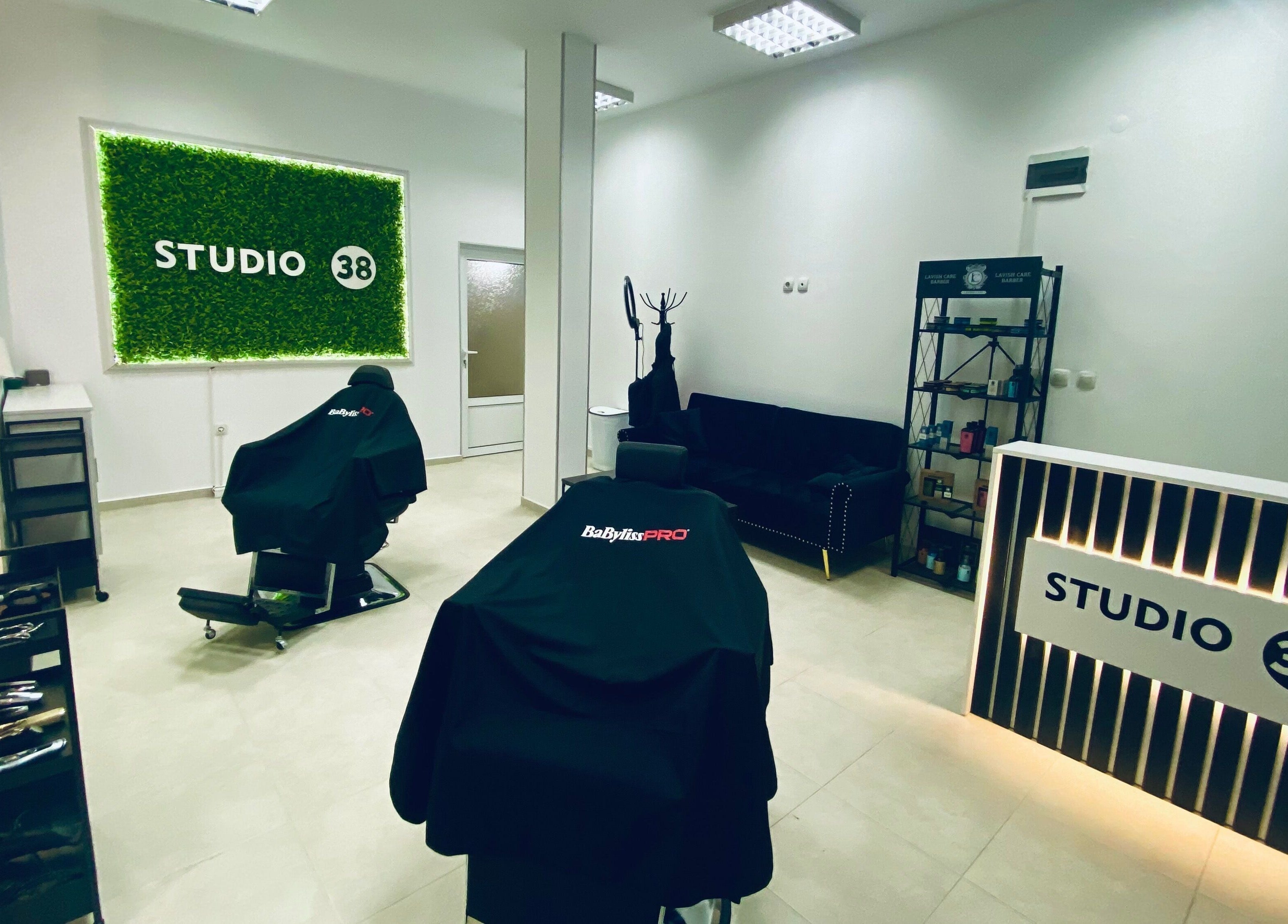 Modern interior of Studio 38 Barber Shop in Plovdiv, BG, featuring sleek barber chairs and stylish decor.