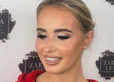 Smiling woman showcasing makeup artistry at Makeup & Lashes By Zara Lee, Tralee, County Kerry, IE.