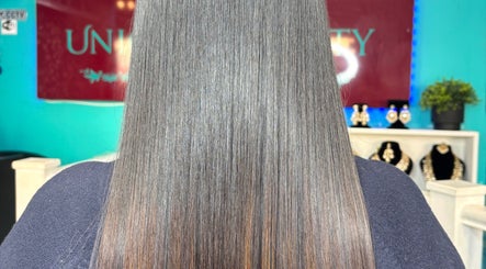 Straight, shiny hair styled at Unique Beauty House, Reading, England, GB.