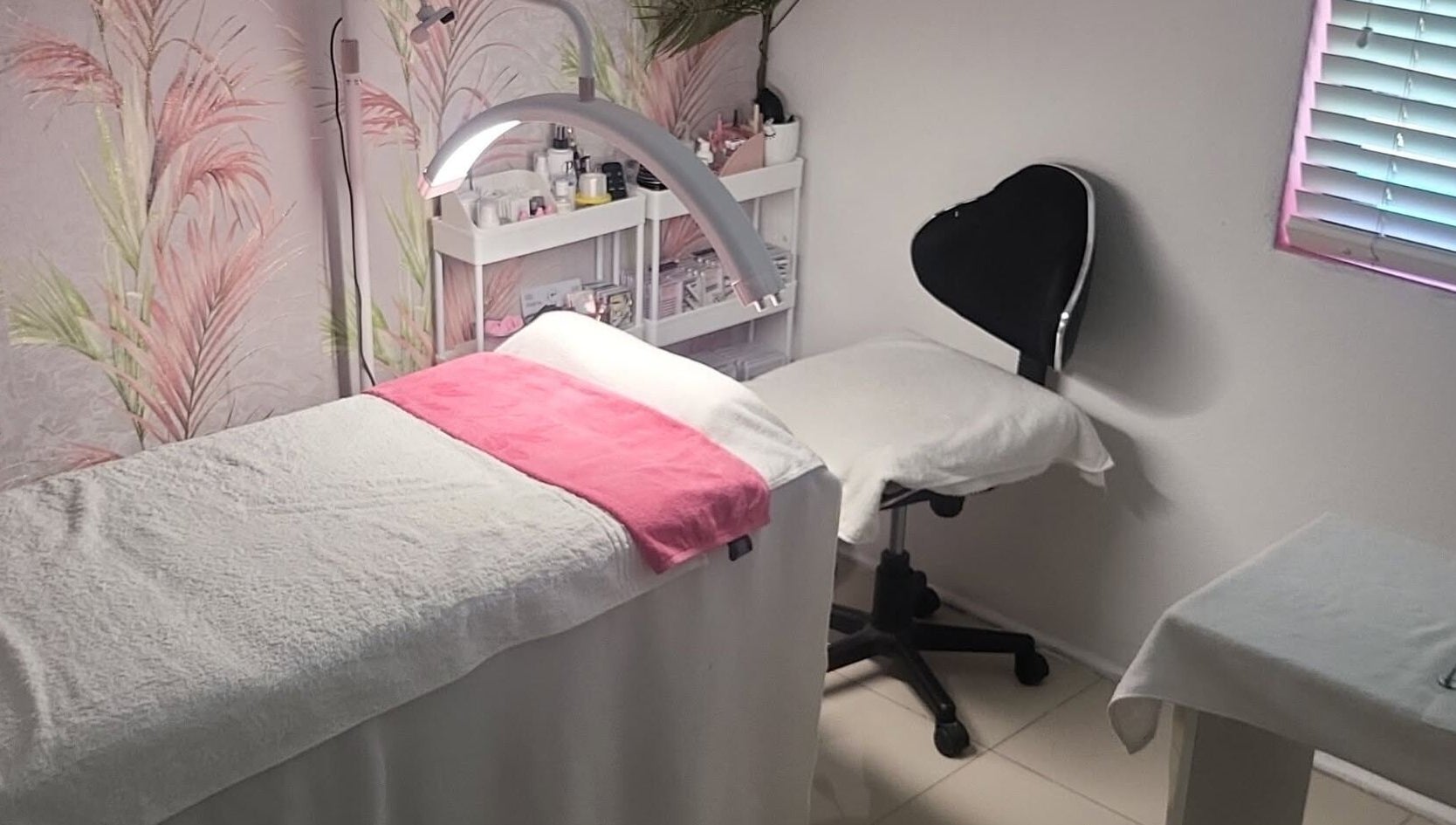 Relaxing therapy room at Touch of Chic, Cape Town, Western Cape, ZA, featuring cozy bed and ambient decor.