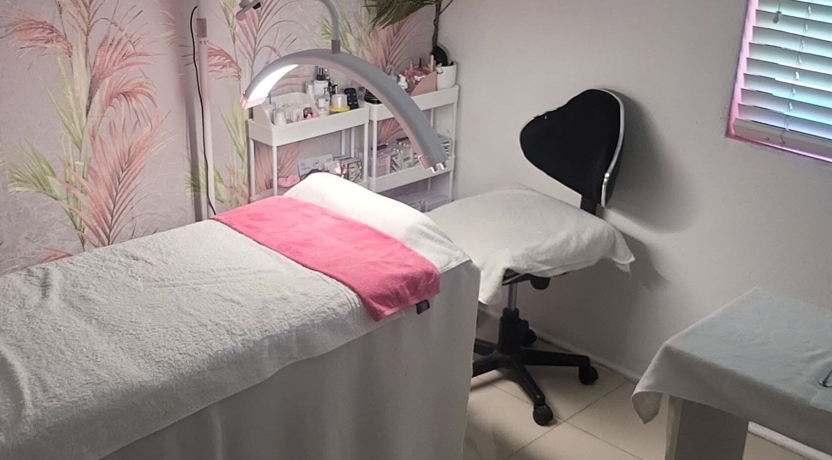 Relaxing therapy room at Touch of Chic, Cape Town, Western Cape, ZA, featuring cozy bed and ambient decor.