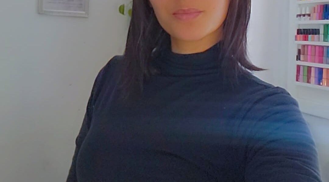 Chic nail salon setup at Touch of Chic, Cape Town, Western Cape, ZA with vibrant polish selection.