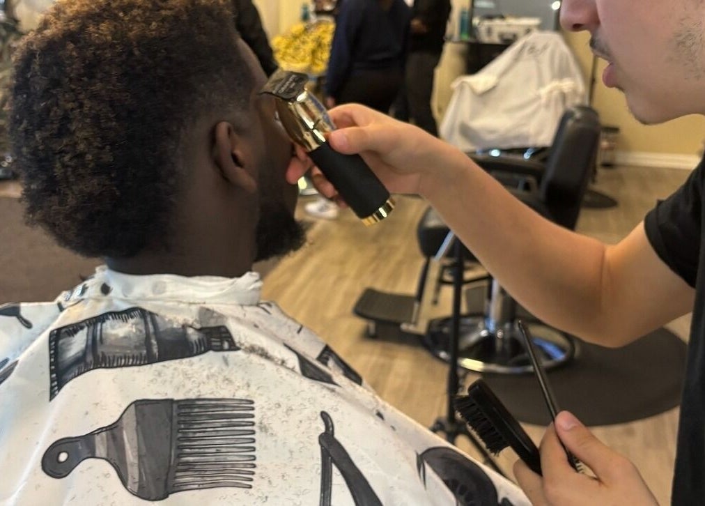 Professional haircut at Uncut Barber Academy in Savannah, Georgia, US showcasing expert skills.