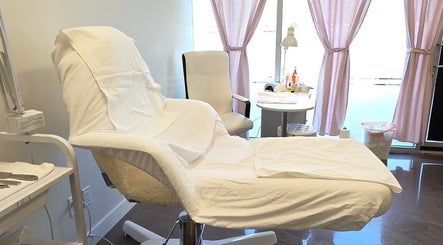 Relaxing treatment room at Beauty Studio, Delta, British Columbia, CA, featuring cozy chairs and elegant decor.
