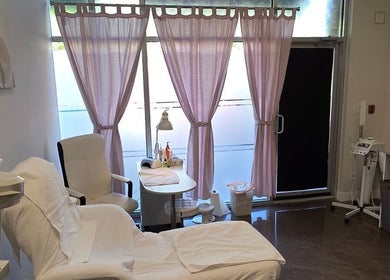 Tranquil treatment room at Beauty Studio, Delta, British Columbia, CA with comfy chairs and soft lighting.