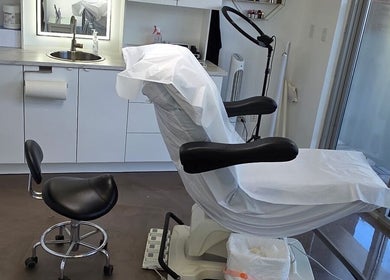 Luxury treatment chair at Beauty Studio in Delta, British Columbia, CA, with modern interior design.