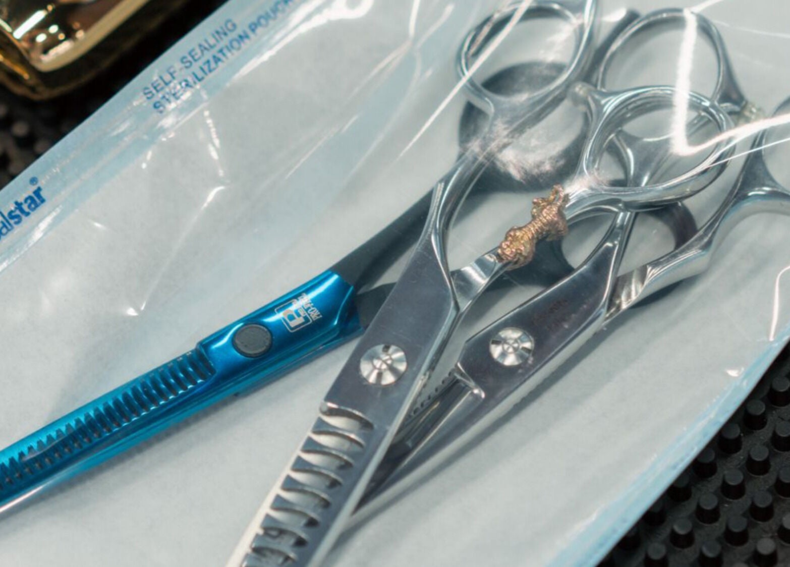 Sterilized hair scissors on a sealed packet at Sky Beauty Roof, Amman, Amman Governorate, JO.