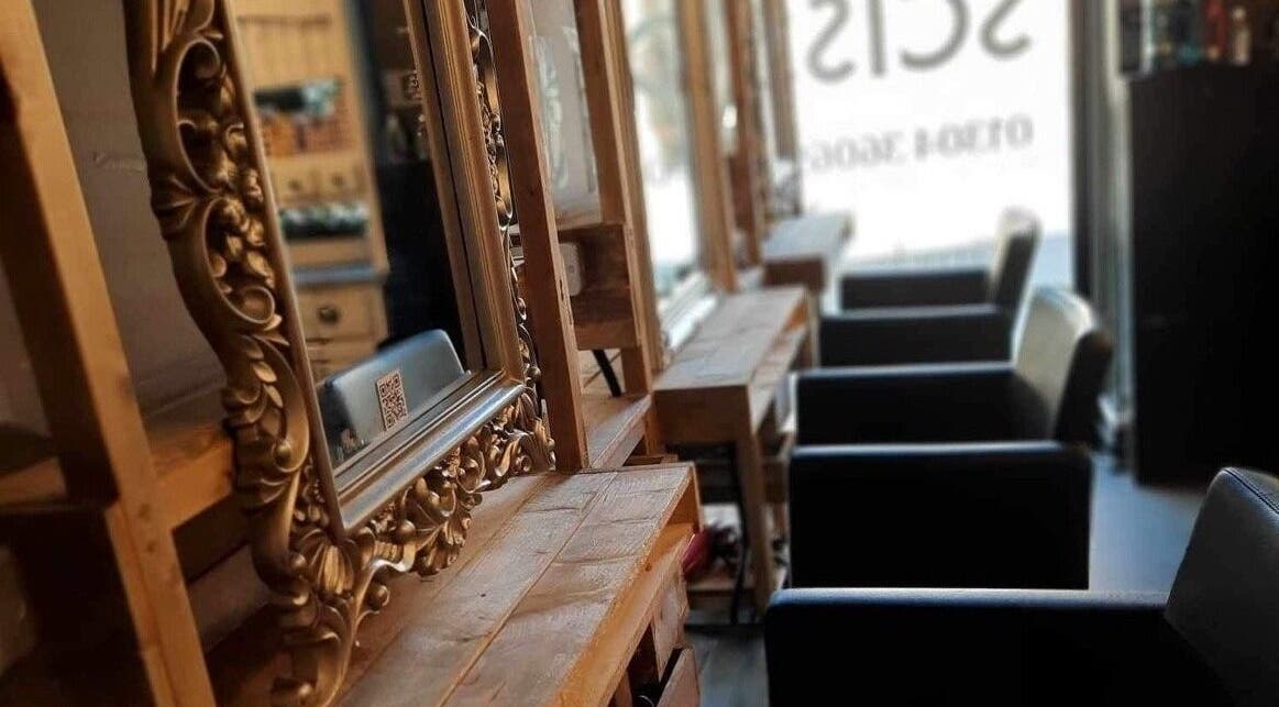 Elegant mirrored styling stations at Rock Paper Scissors Hair & Beauty Salon, Walmer, England, GB.