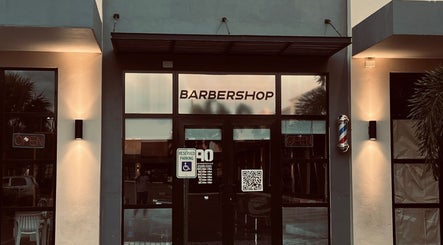 Exterior of Barbershop90 in Willemstad, Curaçao showcasing modern design and welcoming entrance.