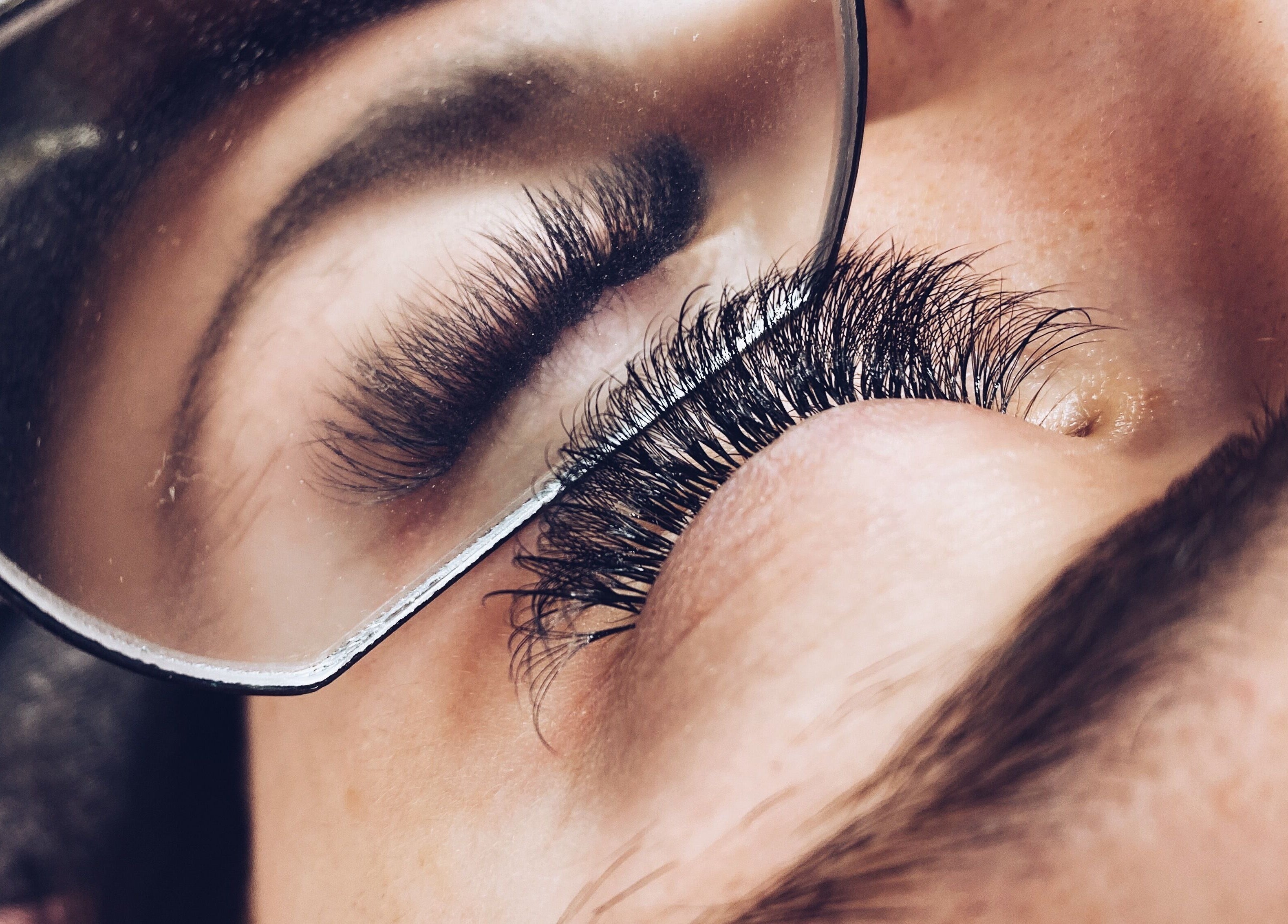Close-up of eyelash extensions at Gwen’s Aesthetics in Pembroke, Ontario, CA showcasing detailed lash work.