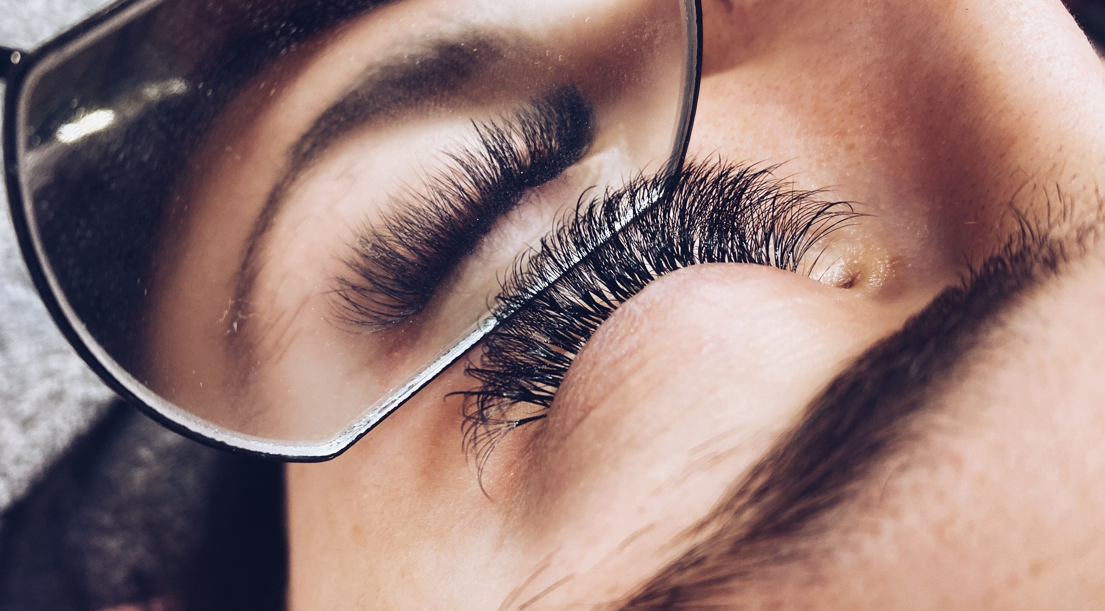 Close-up of eyelash extensions at Gwen’s Aesthetics in Pembroke, Ontario, CA showcasing detailed lash work.