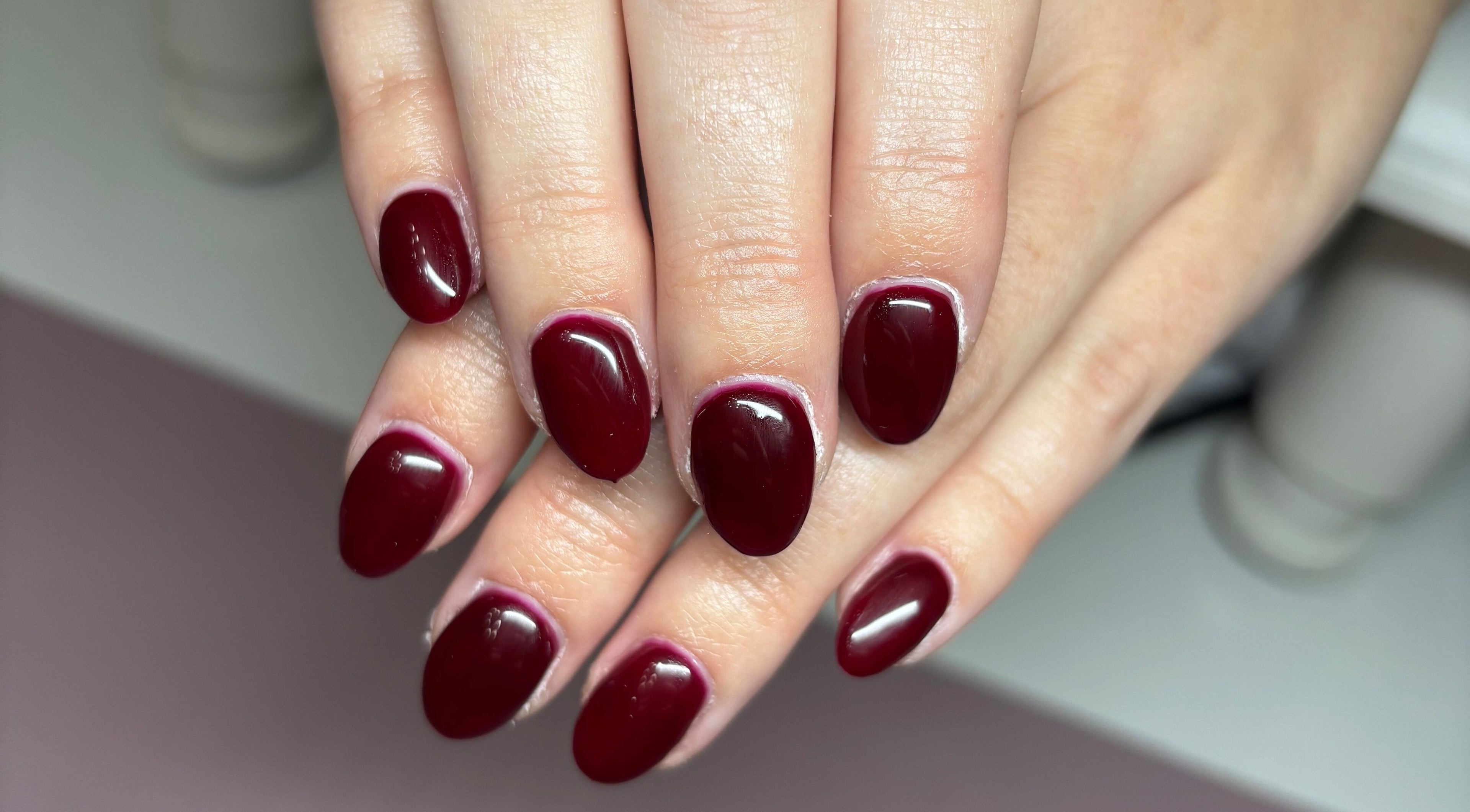 Elegant crimson manicure at Gwen’s Aesthetics, Pembroke, Ontario, CA. Perfect finish and vibrant color.