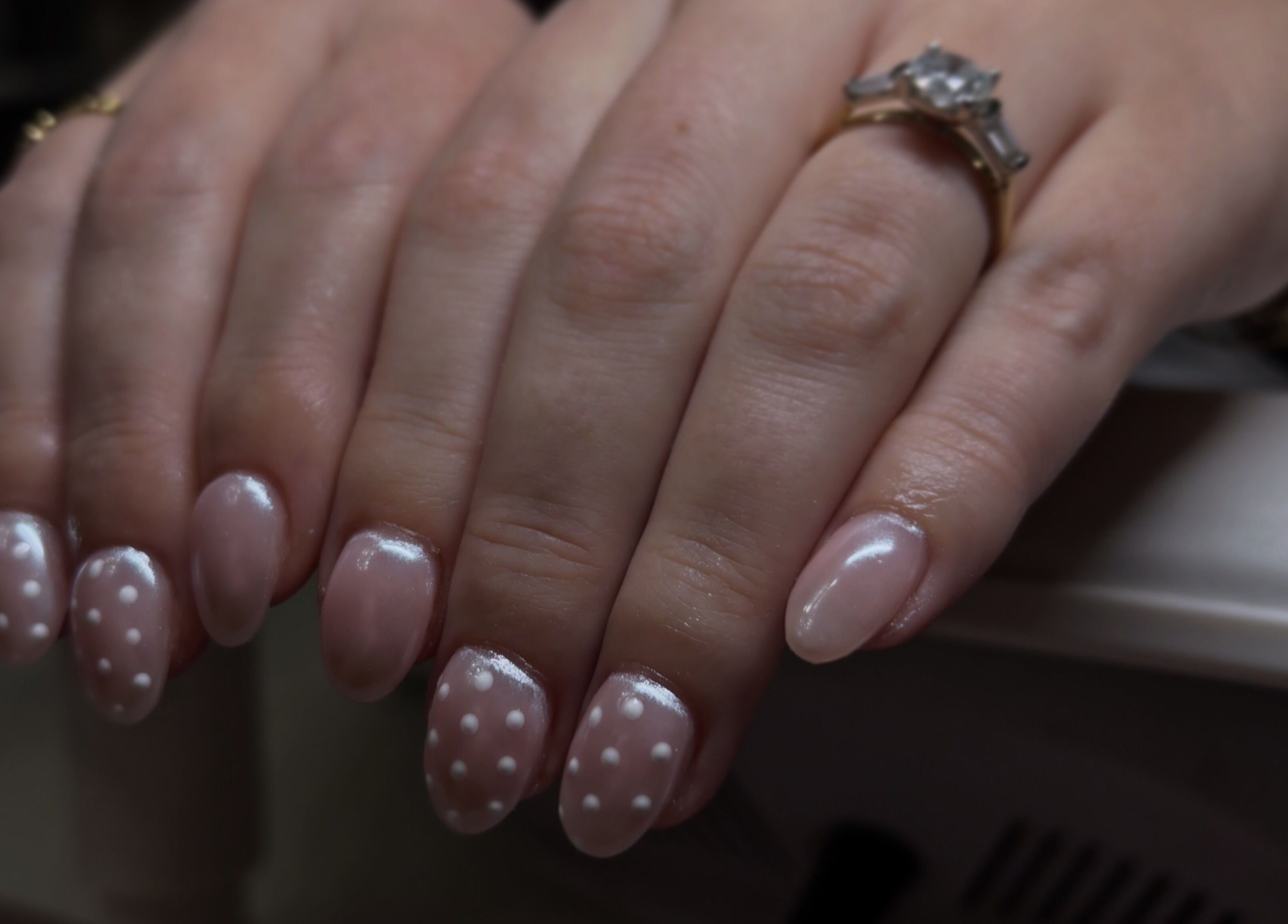 Polka dot nail art design at Gwen’s Aesthetics, Pembroke, Ontario, CA. Perfect for a chic, sophisticated look.
