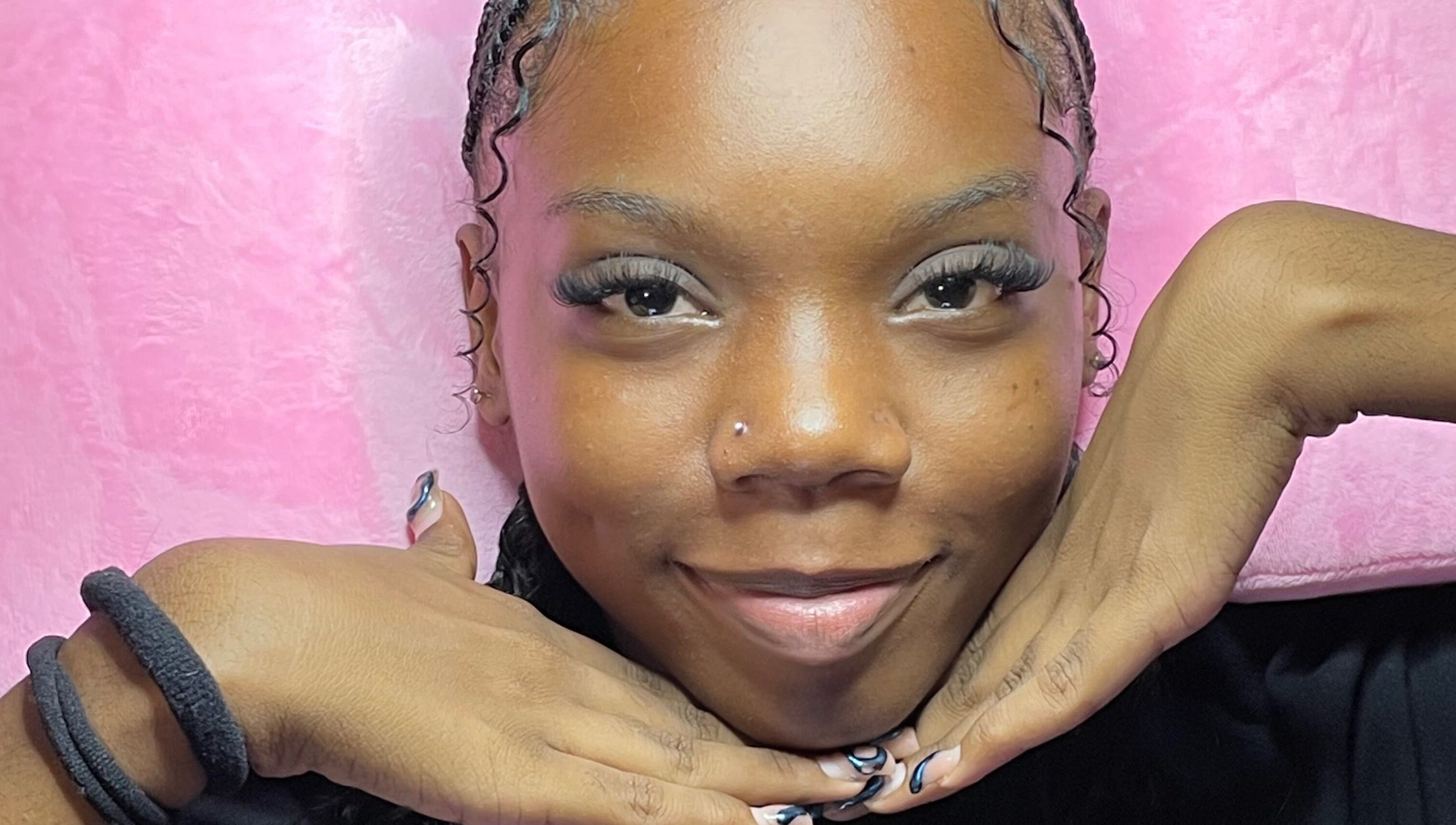 Smiling individual showcasing eyelashes at Waxxed & Lashxed, Saint Peter, Saint Peter, BB.