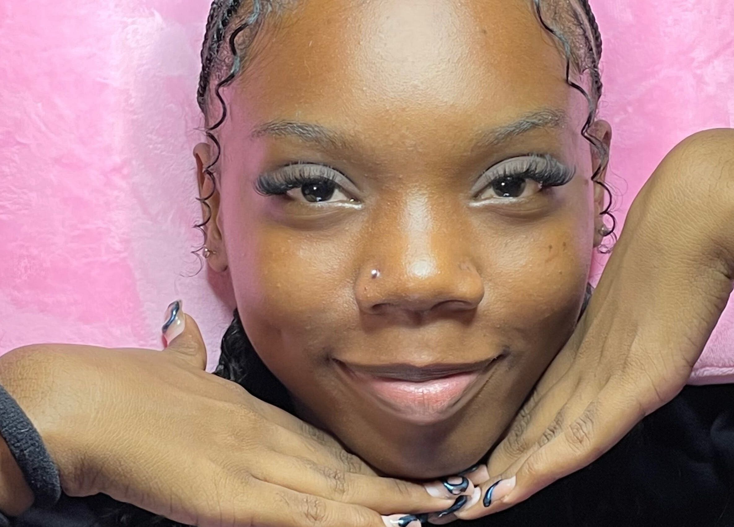 Smiling individual showcasing eyelashes at Waxxed & Lashxed, Saint Peter, Saint Peter, BB.