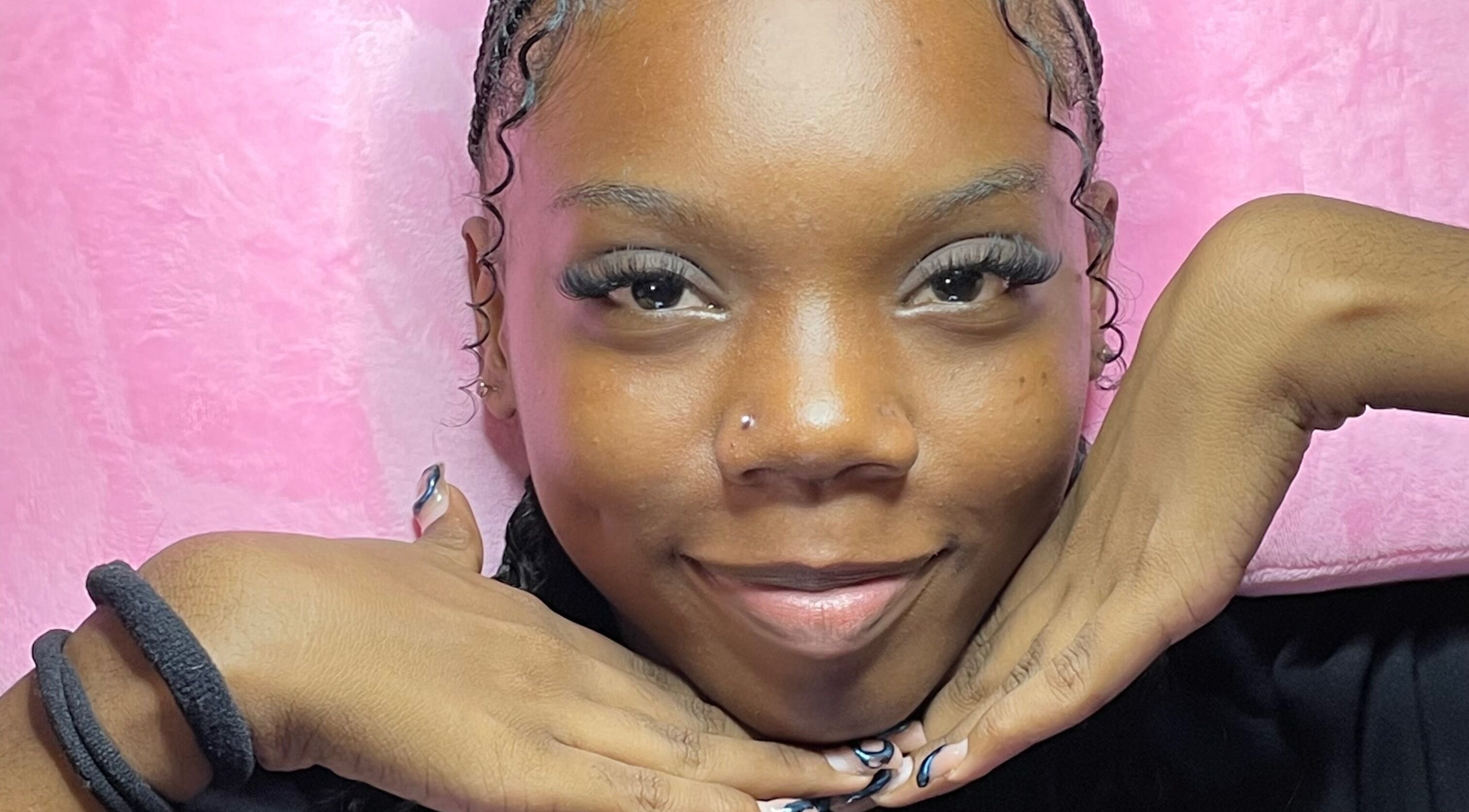 Smiling individual showcasing eyelashes at Waxxed & Lashxed, Saint Peter, Saint Peter, BB.