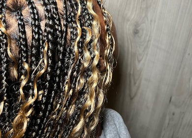 Stylish braided hair with highlights at BeautyByFaves YYC, Calgary, Alberta, CA.