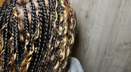 Stylish braided hair with highlights at BeautyByFaves YYC, Calgary, Alberta, CA.